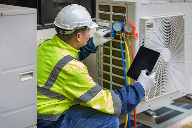 Professional Hvac technician working in Justice, OK